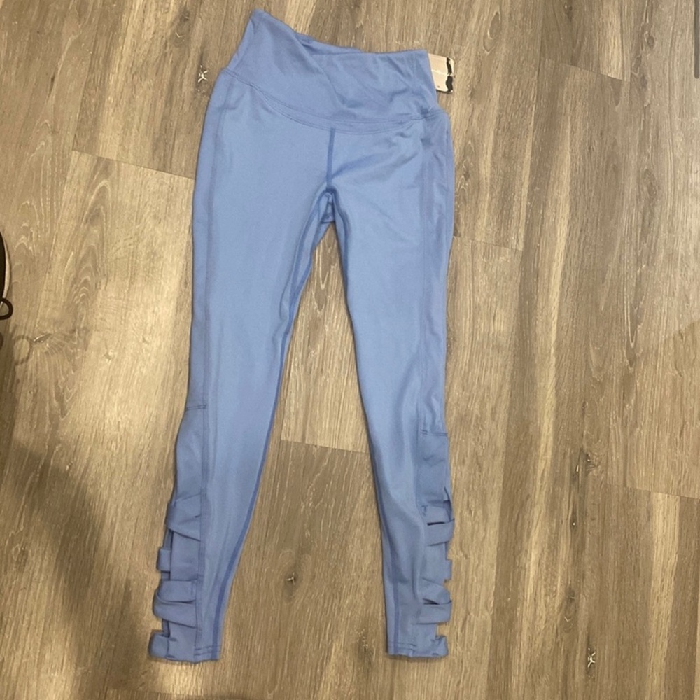 Free People- Blue Leggings with CrissCross on Back of Calves. NWT